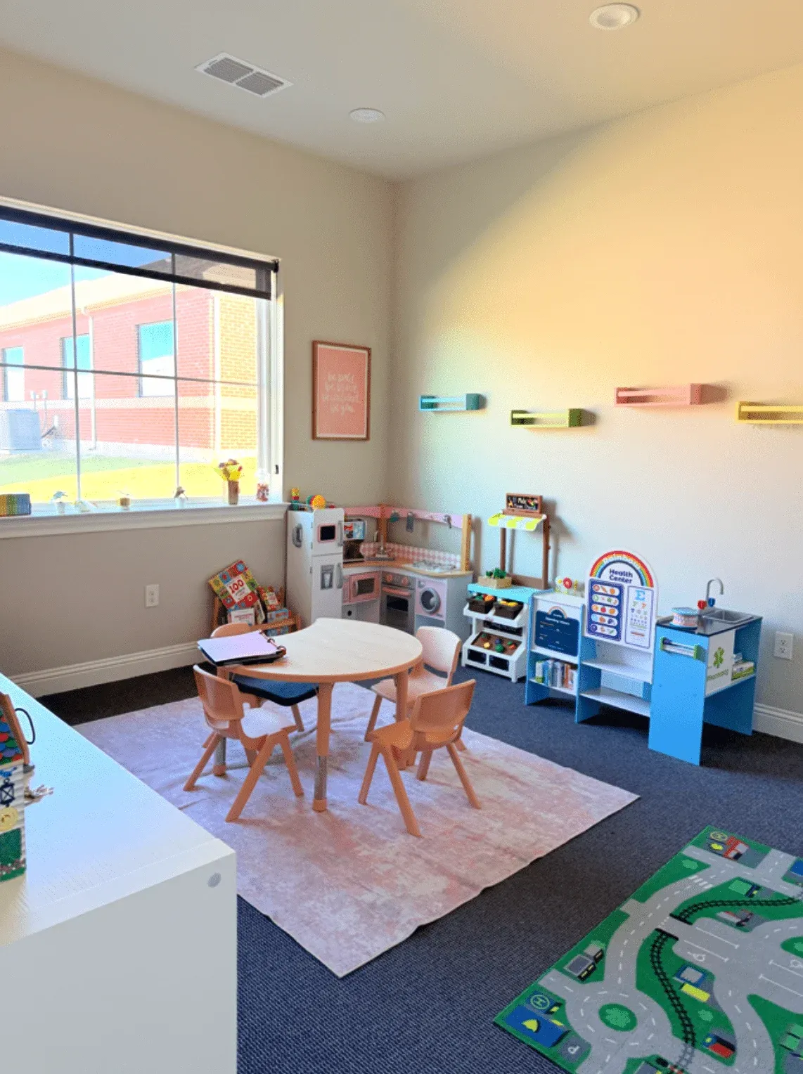 Play-based pediatric speech therapy room with child-sized table and chairs at Jars of Play